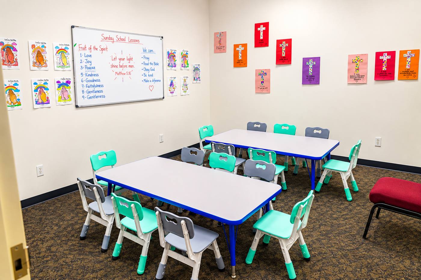 A Powerline Kids classroom with the Sunday lesson on the board and children&rsquo;s artwork on the walls